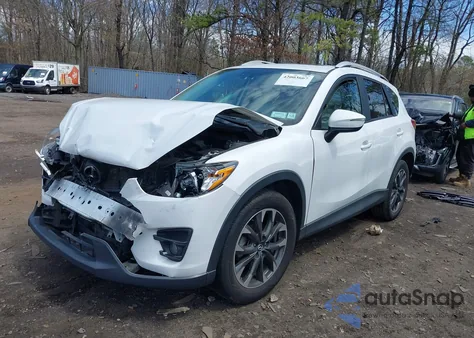 2016 Mazda Cx-5 Grand Touring z USA, uszkodzony, nr VIN JM3KE4DY8G0859940